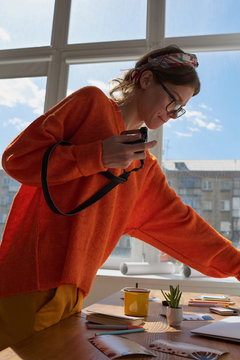 Woman Taking Flatlay Pictures
