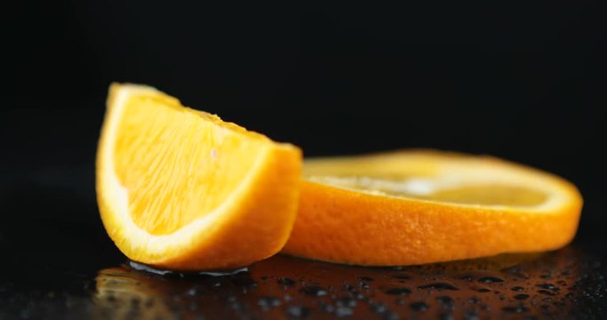 Close-up of a delicious ripe orange slices rotate