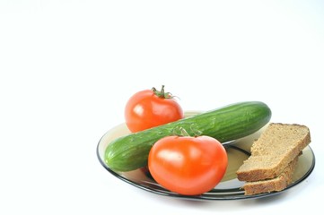 bread and vegetables on a plate