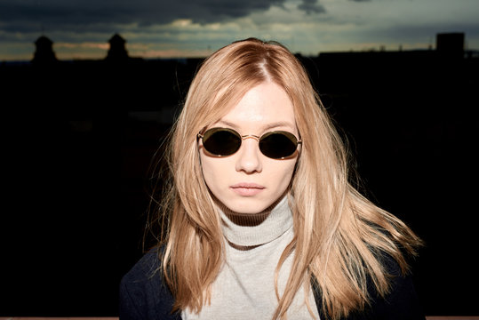 blonde woman in sunglasses