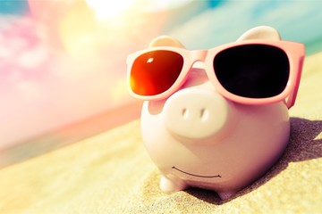 Piggy Bank Wearing Sunglasses Relaxing At The