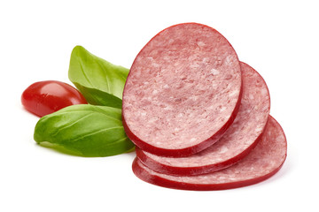 Sliced cold Salami, smoked sausage with basil, close-up, isolated on white background