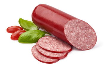 Salami smoked sausage with basil leaves, close-up, isolated on white background