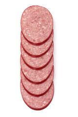 Sliced salami smoked sausage, top view, isolated on white background