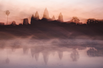 Old temple in mist at sunrise.