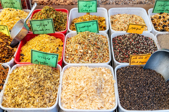 Fresh and colorful spices sold in an open air market while sightseeing in Tel Aviv, Israel.