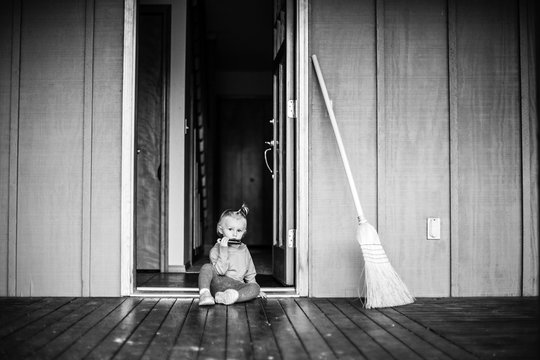 Portrait of girl playing harmonica