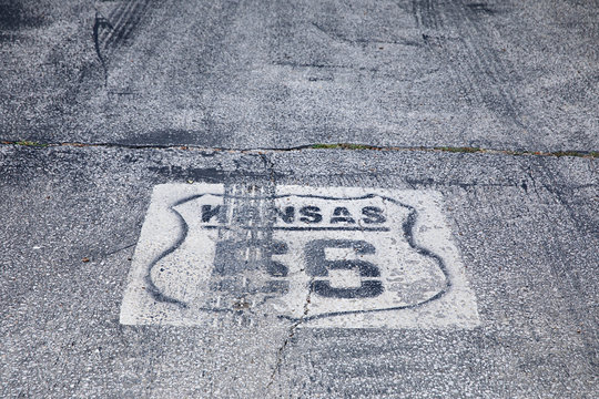 Weathered road sign on Route 66 in Kansas, USA