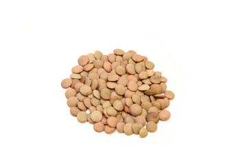 The small amount, a pile, of green lentils isolated on a white background. 