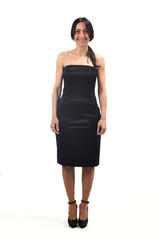 full portrait of a middle age woman with off the shoulder dress and heeled shoes isolated on white