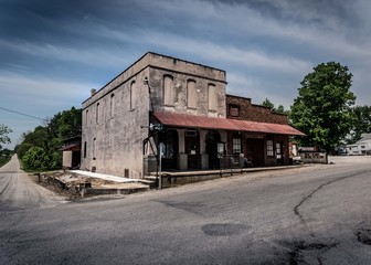A photo of an old abandoned building on a summer day in small town in Indiana,  USA