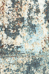Grunge wall texture, iron rusty gates painted with white-blue-gray paint. Cracked paint on metal, seamless background, blank for text. vertical frame