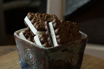 handmade ceramic plate with chocolate milky biscuits