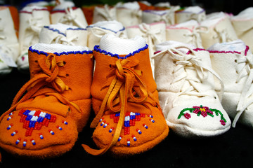 Native American suede childrens moccasins with beading.