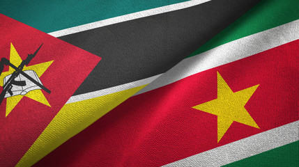 Mozambique and Suriname two flags textile cloth, fabric texture