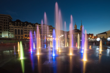 Fototapeta na wymiar Musical colorful fountain
