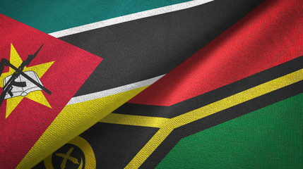 Fototapeta premium Mozambique and Vanuatu two flags textile cloth, fabric texture