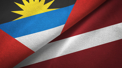Antigua and Barbuda and Latvia two flags textile cloth, fabric texture