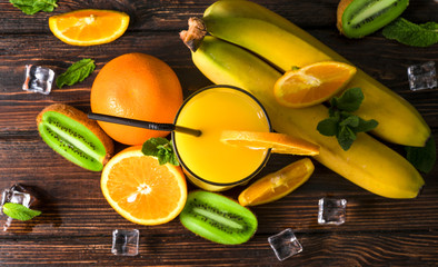 Orange juice on a wooden table