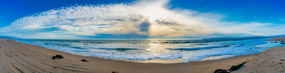 Panorama of Ocean and Beach and Sand at Sunset