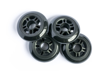Inline skate wheels, four rollerblade wheels isolated on white background