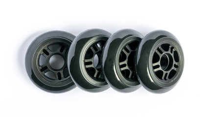 Inline skate wheels, four rollerblade wheels isolated on white background