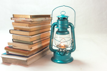 Old oil lamp lantern with flame