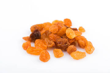 raisins on a white background. dried grapes. raisins close up