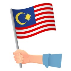 Malaysia flag in hand