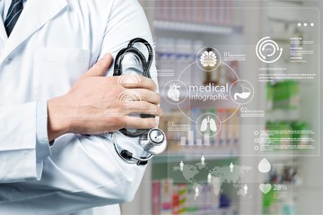 Young man doctor holding stethoscope