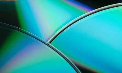 Colorful background with shiny compact discs.