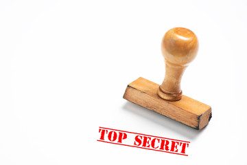 Rubber stamp with  top secret sign on white background.