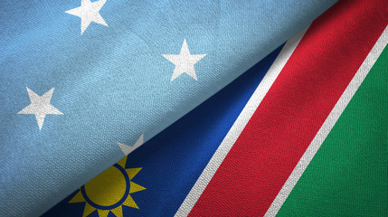 Micronesia and Namibia two flags textile cloth, fabric texture