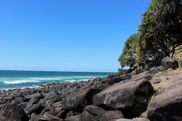 Fototapeta na wymiar Rocky ocean coastline on a clear day