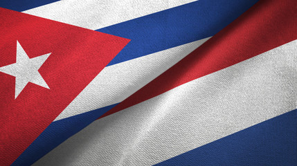 Cuba and Netherlands two flags textile cloth, fabric texture