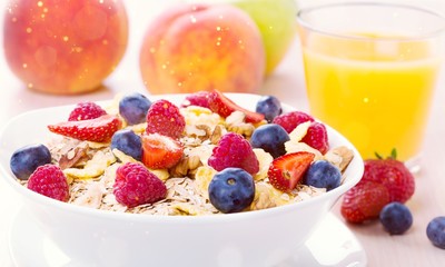 Delicious oat flakes with berries, close-up