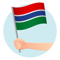 Gambia flag in hand