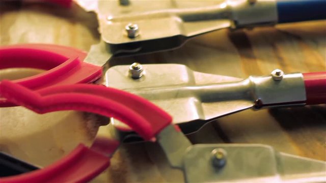 Metal Stick Clamps. Close-Up. 