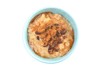 Cinnamon Raisin Oatmeal in a Blue Bowl on a White Background