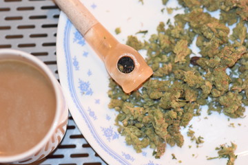 COFFEE...POT...AND PIPE.....PLATE ON STEEL TABLE