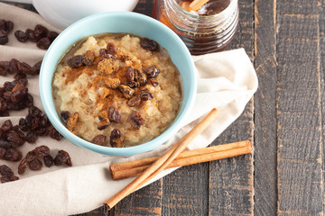 Cinnamon Raisin Oatmeal on a Wooden Table