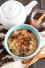 Cinnamon Raisin Oatmeal on a Wooden Table
