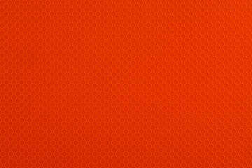 Close up on an orange abstract texture pattern as the background. Copy space for your text.