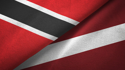 Fototapeta na wymiar Trinidad and Tobago and Latvia two flags textile cloth, fabric texture
