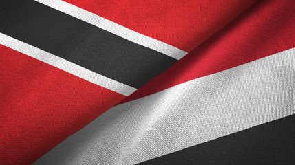 Fototapeta na wymiar Trinidad and Tobago and Yemen two flags textile cloth, fabric texture