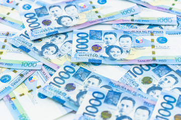 Obraz na płótnie Canvas Philippine 1000 peso bill, Philippines money currency, Philippine money bills background.