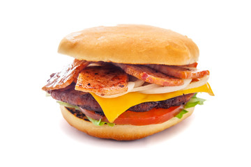 juicy appetizing cheeseburger with a big chop and bacon, isolate, close-up