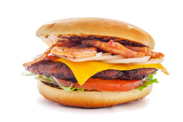 juicy appetizing cheeseburger with a big chop and bacon, isolate, close-up