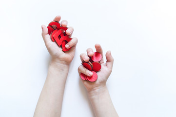 Montessori material. Children's hands. The study of mathematics