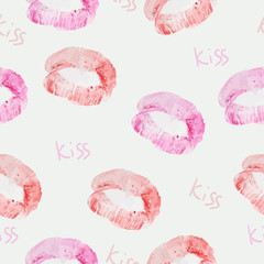 Vector seamless background. lip prints and the inscription kiss. Print natural lip prints.